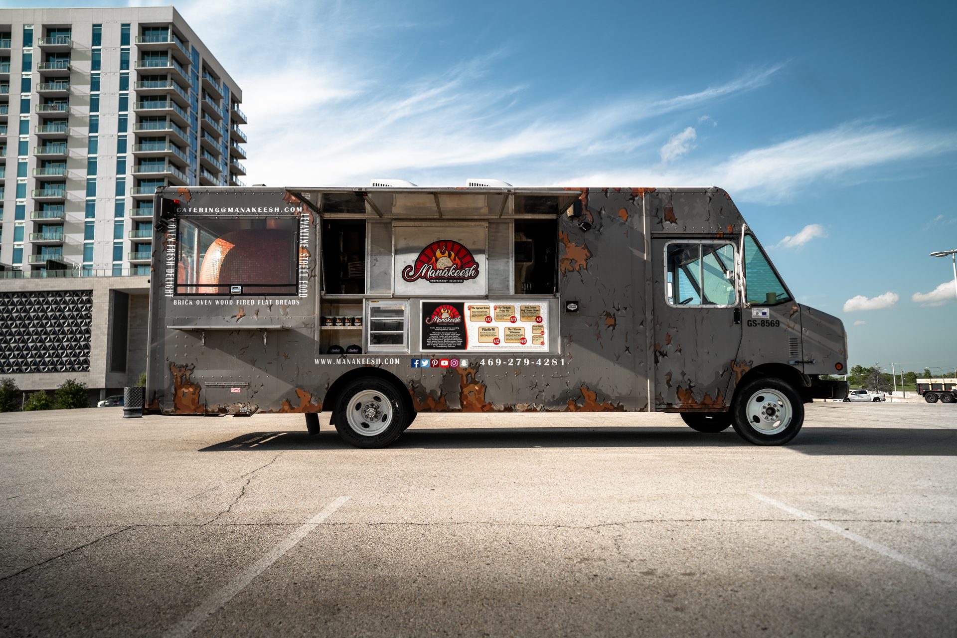 Full exterior view with menu and branding