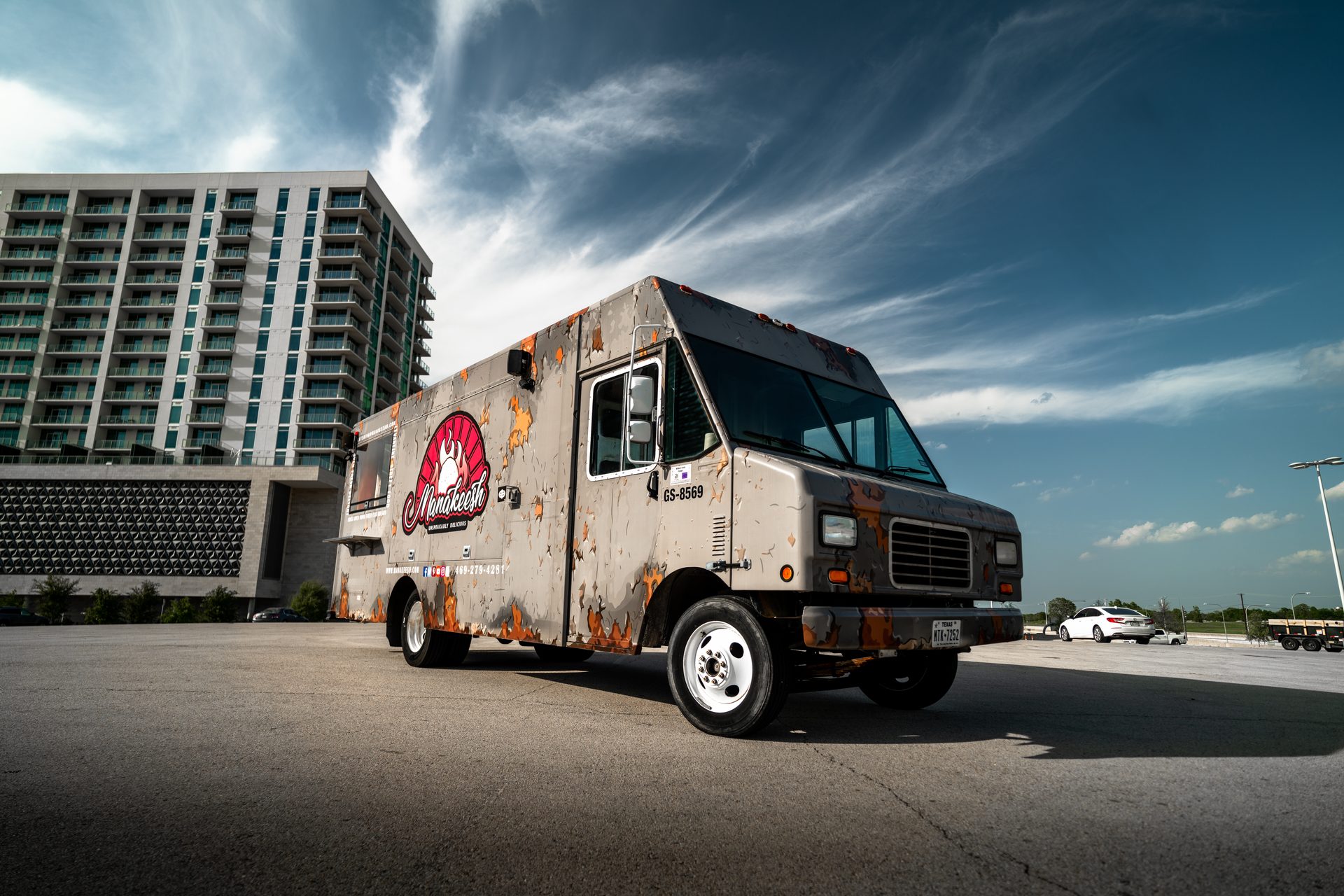 Truck exterior parked in lot — passenger side
