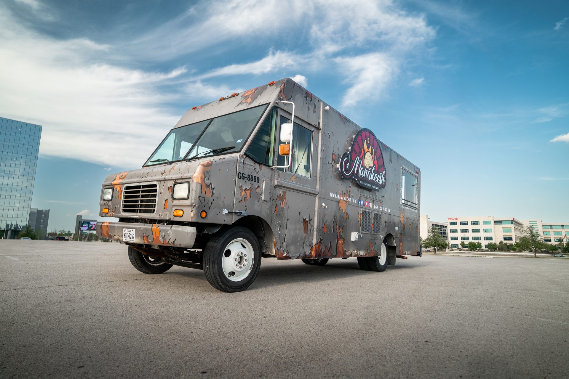 Full exterior view parked in lot