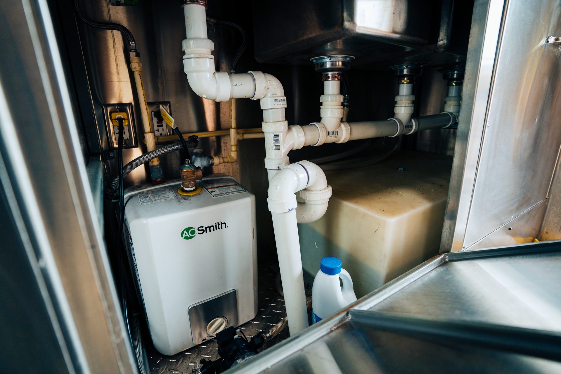 Water heater, plumbing, and water tank