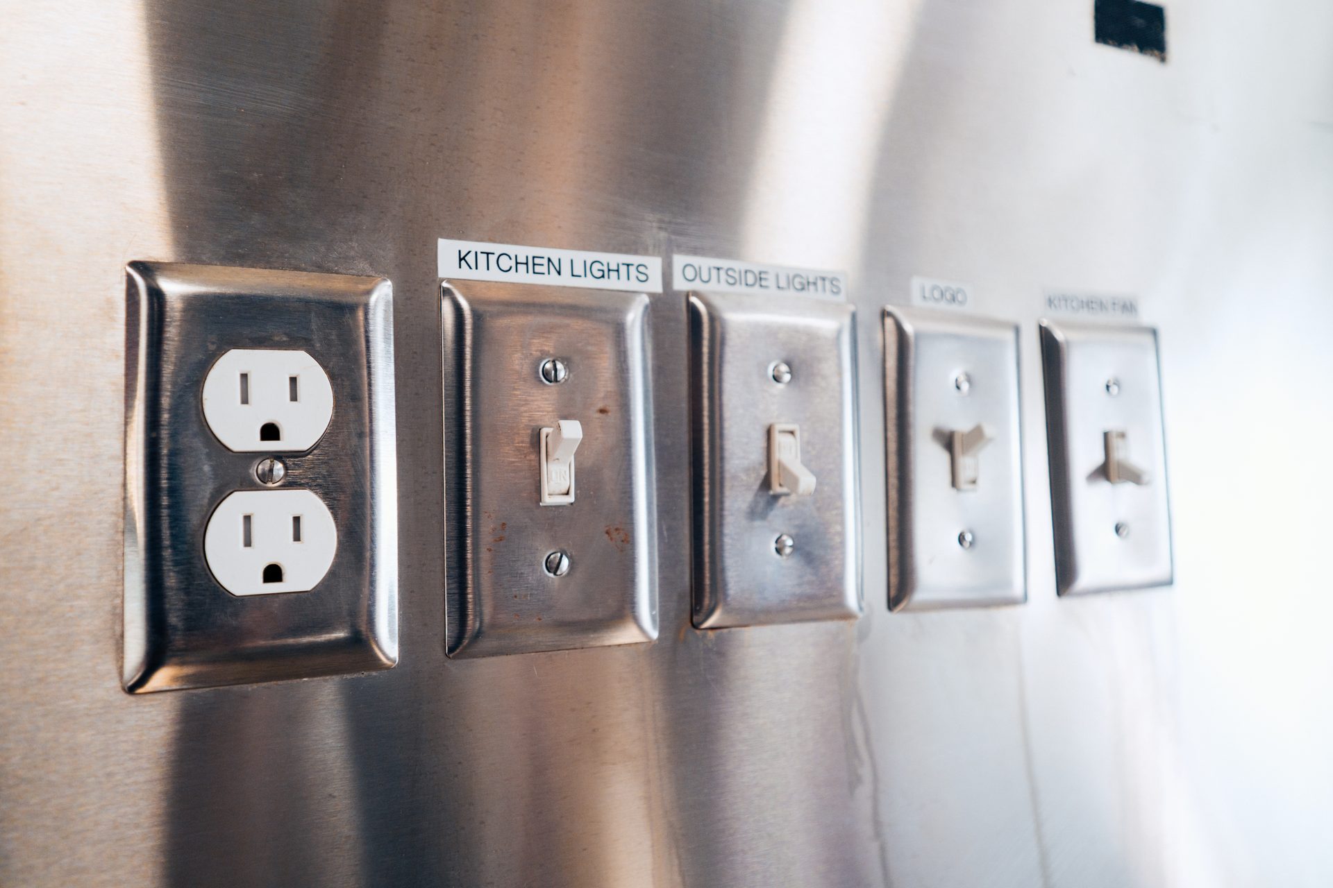 Electrical outlets and light switches — kitchen, outside, logo, fan
